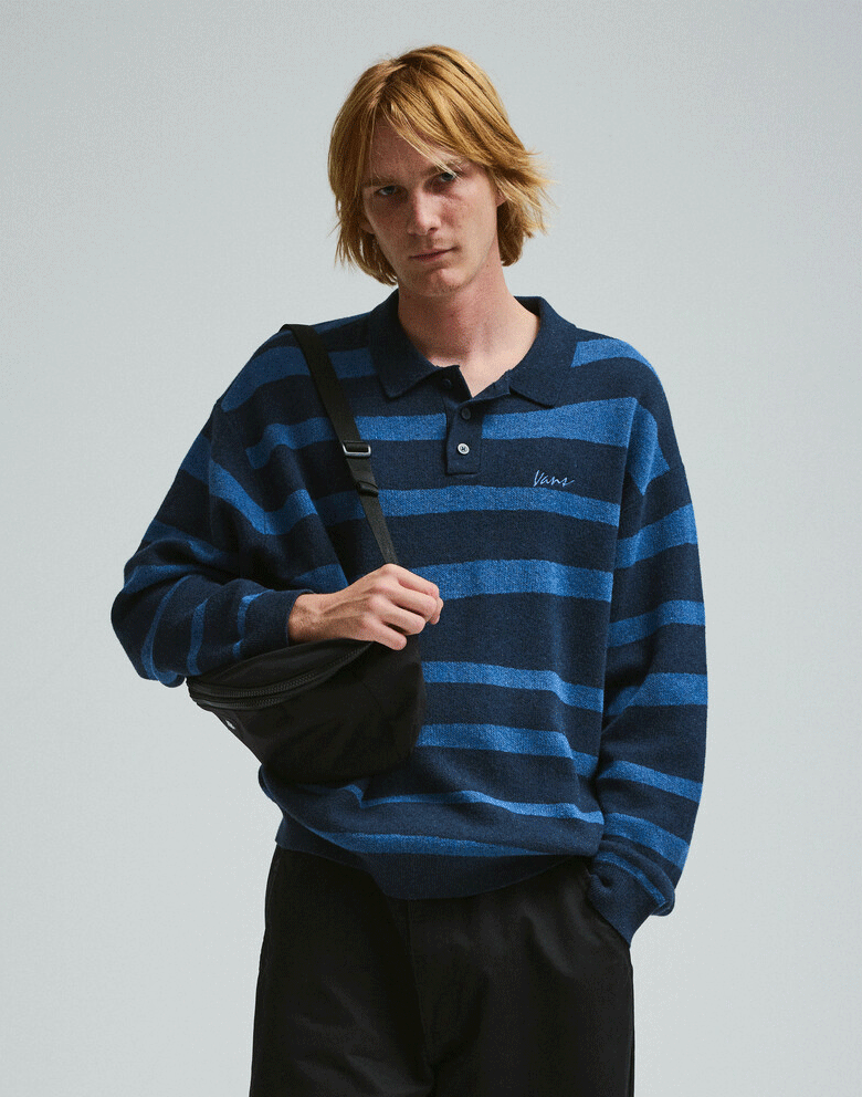 A young man and young woman in fall layers and styles.