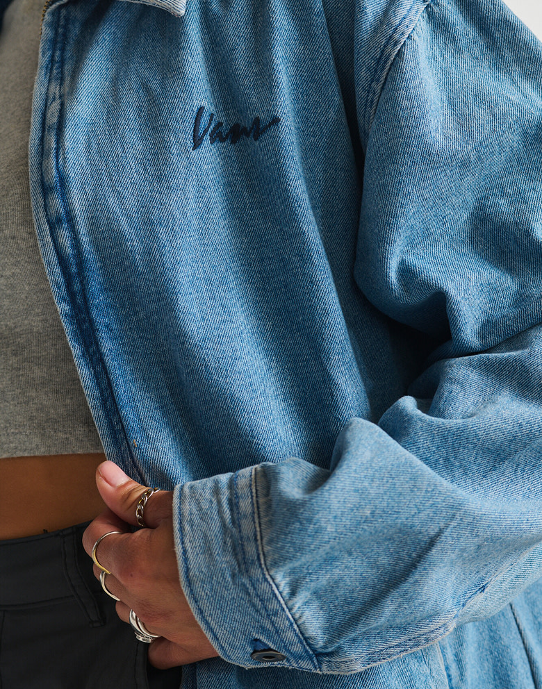 A close-up of the stitching on the Pitstop Denim Jacket that says "Vans."