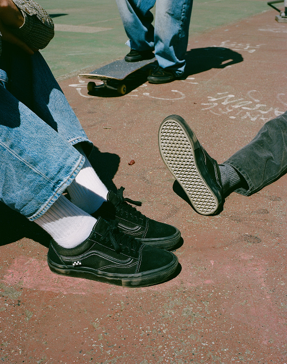A close-up of the all-black Skate Old Skool on Vans Skate Team Riders.