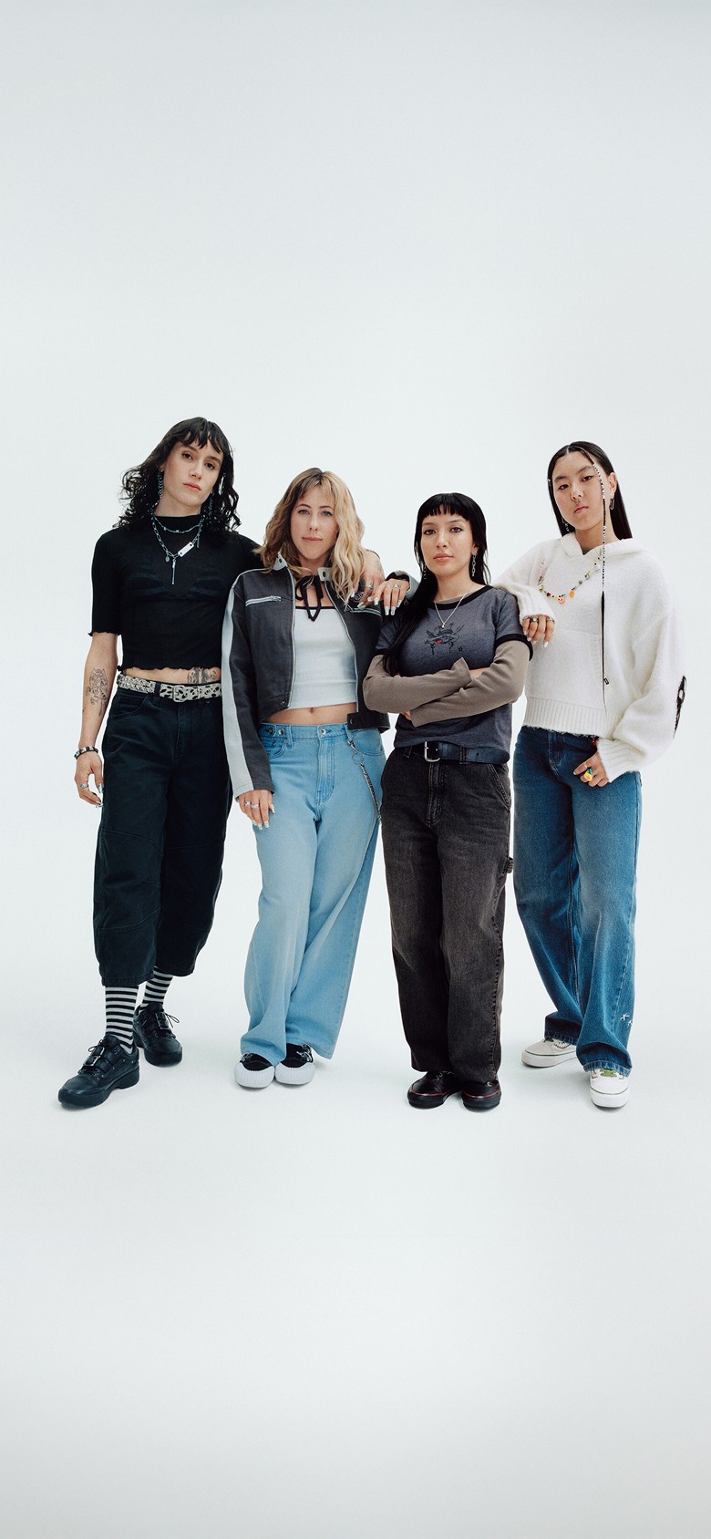 Vans Skater Cocona Hiraki holds up her Premium Old Skool in a photography studio with her name on the interior sole.
