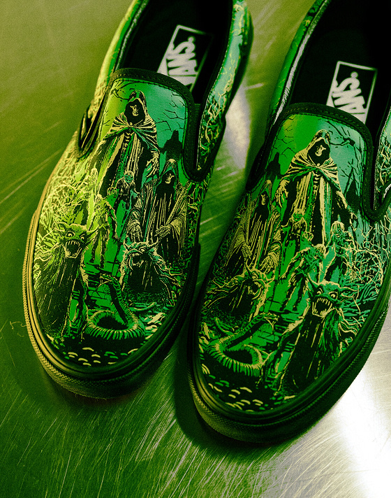 An overhead shot of the spooky green and yellow Halloween graphic on the Classic Slip-On as part of the Vans Halloween collection.