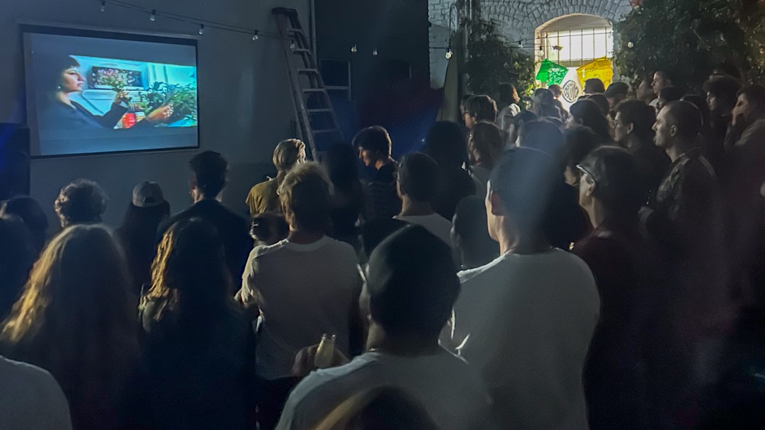 Lola Mignot's film premiere at Oblivion with a packed, standing crowd watching the film.