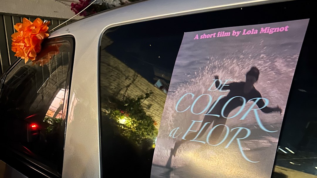 The poster for De Color A Flor outside of Oblivion in Los Angeles.