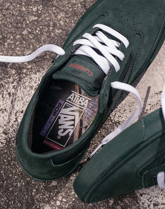 The green Curren from the United Through Skateboarding collection with the Vans x Atiba logo on the insole.