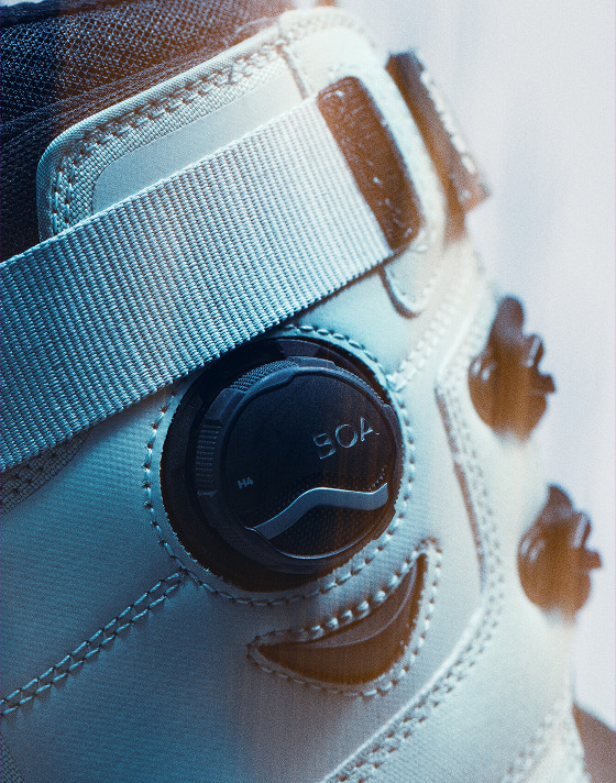 A close-up of the Vans Hybrid Plus BOA Custom Fit System on the Infuse snowboard boot.