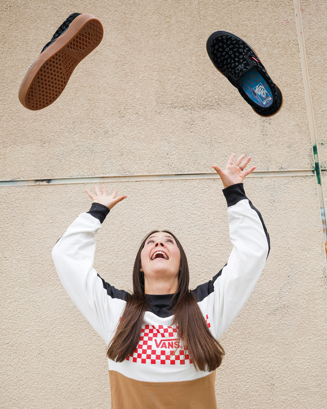 The BMX Slip-On Wafflecup shoes being tossed into the air.