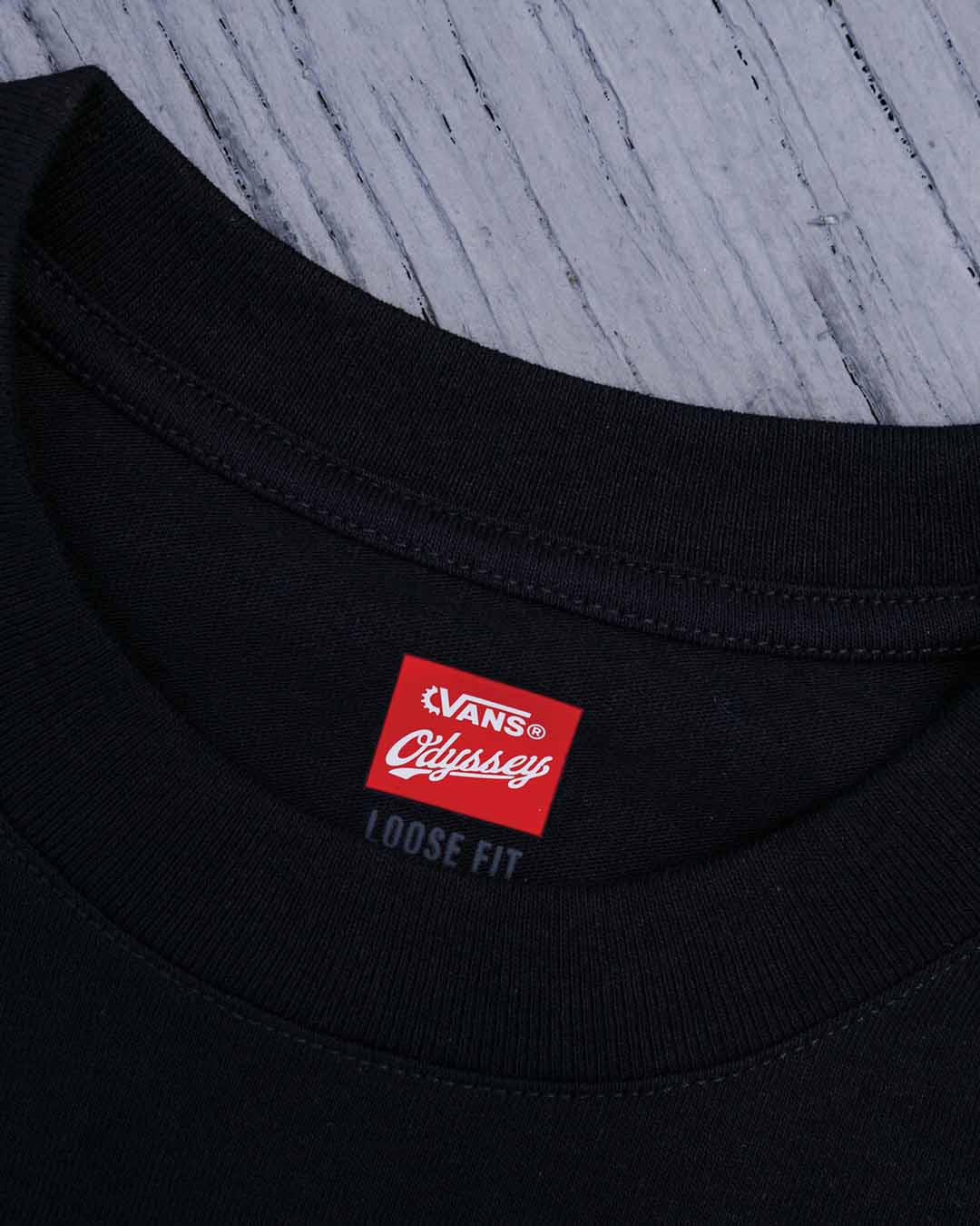 Closeup of the Vans X Odyssey, focusing on the branded neck tag.