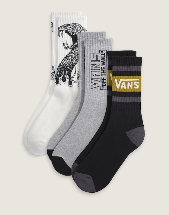 Three pairs of Vans crew socks laid out on top of each other.