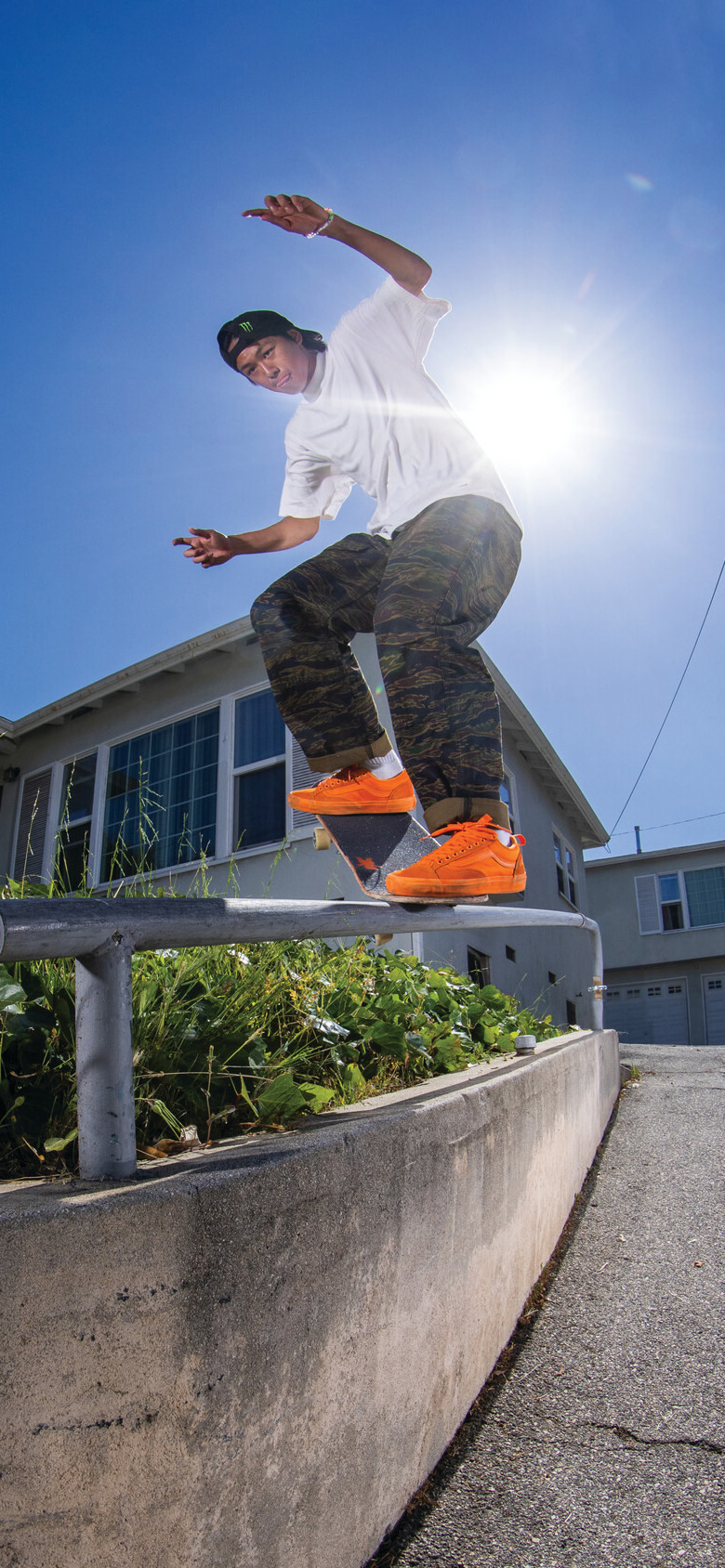 An image of Vans Skate Team Rider Toa Sasaki grinds a rail in the Skate Old Skool 36+ by Atiba for Vans and another of him walking on the concrete.
