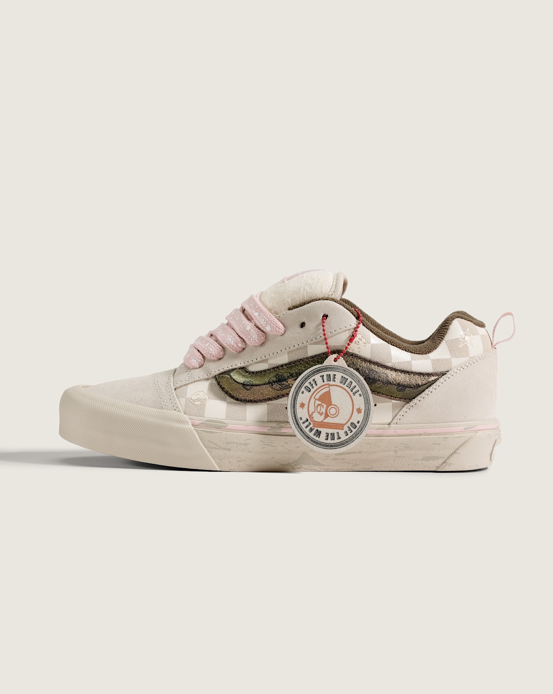Vans × Space Molly beige checkerboard sneaker with pink glitter laces.