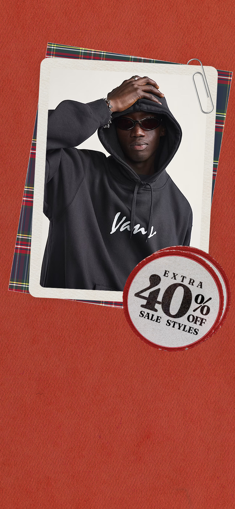 One image of a man in a Vans hoodie and one of the blue Super Lowpro on a red holiday background with a button that reads extra 40% off sale styles.