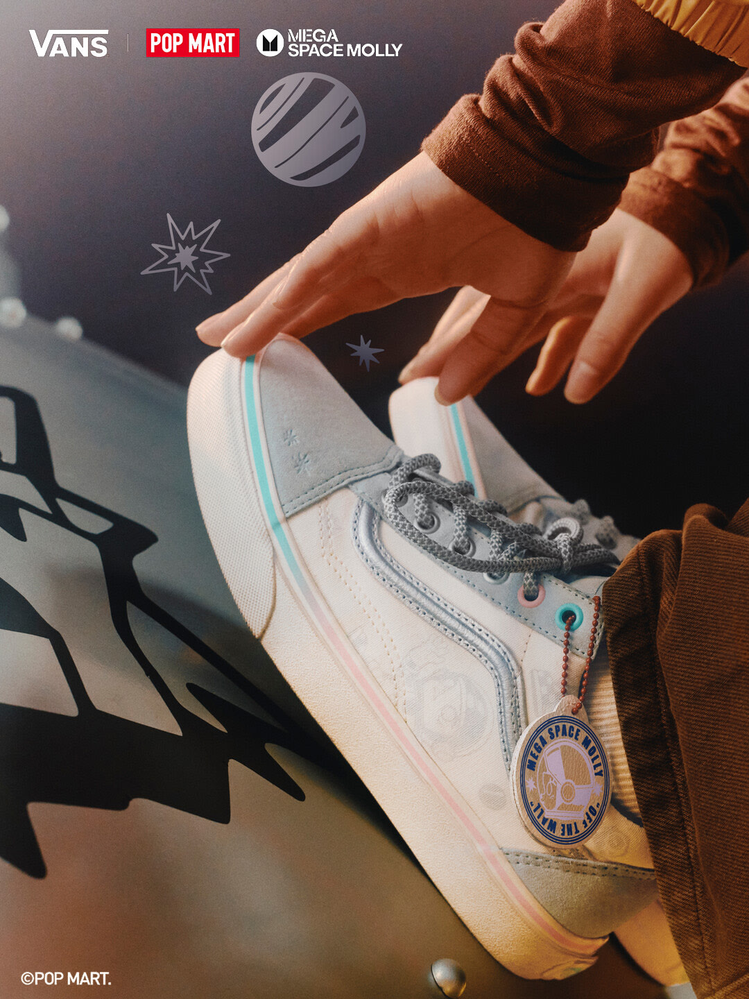 Vans × Space Molly sneaker with pastel trim and planet graphic details.
