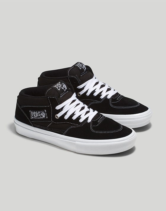 Close-up of the black and white Half Cab in a photography studio.