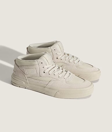 A pair of white Half Cab in a photography studio.