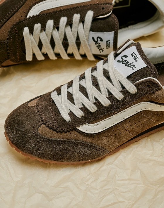 A close-up of the new brown and white colorway on the Super Lowpro in a photography studio.