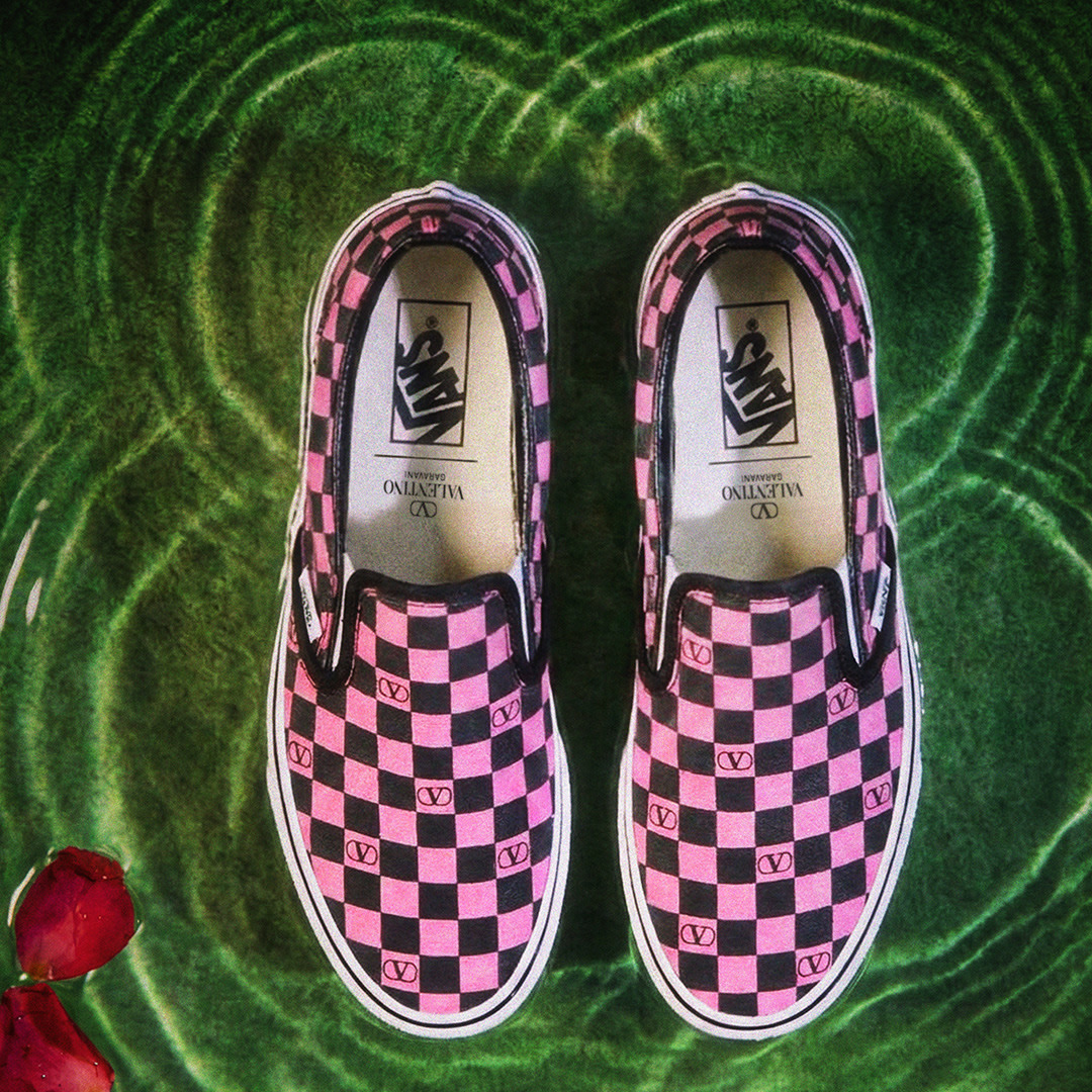 Pink Valentino and Vans Authentic on a flooded floor.