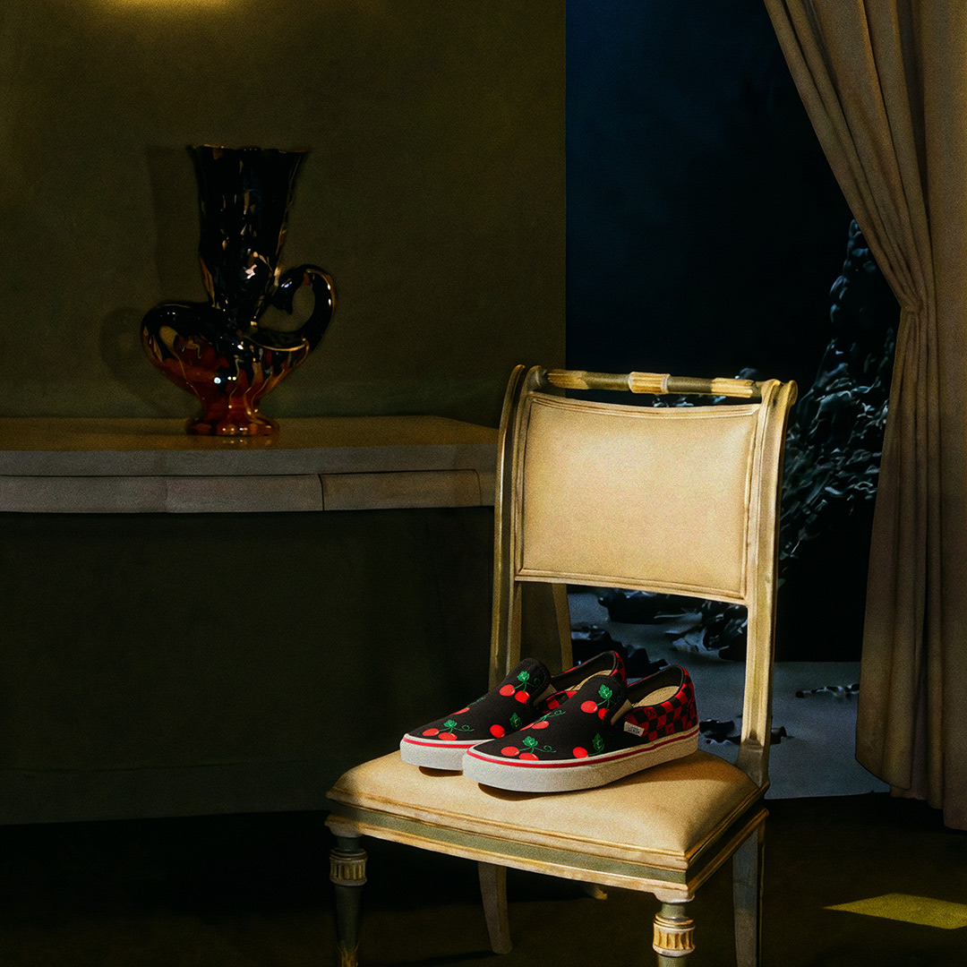 Pink Valentino and Vans Authentic on a flooded floor.