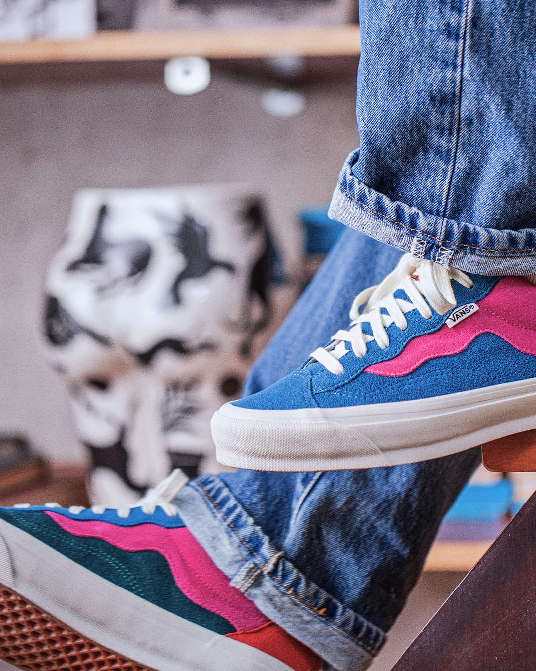 Close up, side view of Vans X Parra shoes being worn.