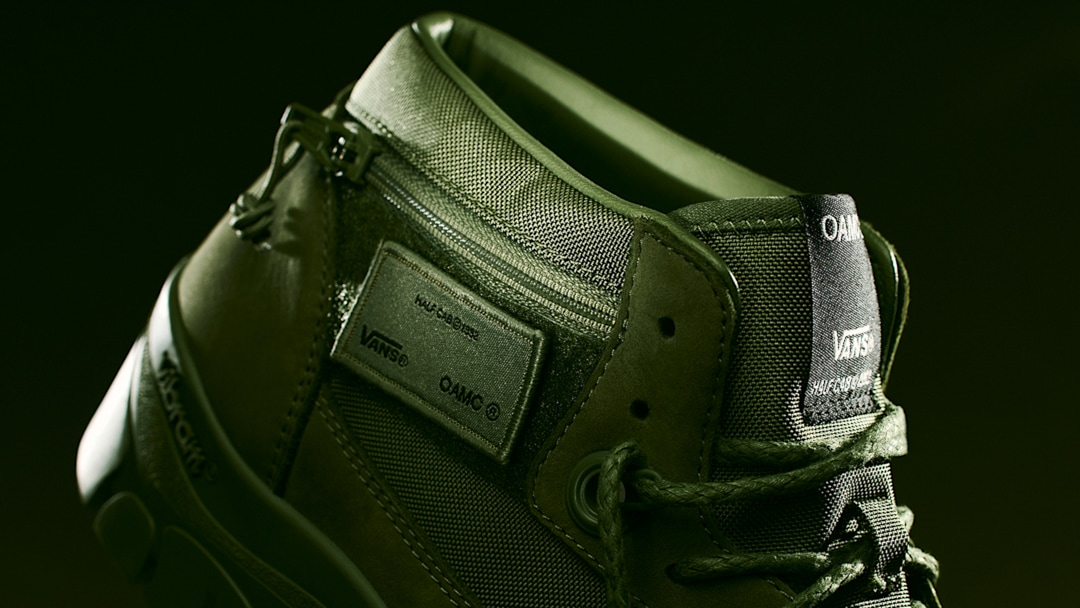 The top of an OTW by Vans x OAMC Half Cab SP Boot on a black background.