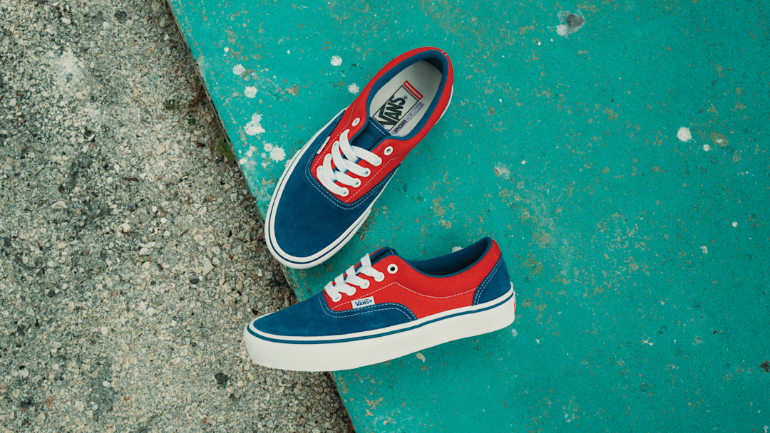 A pair of Skate Era shoes lying on concrete.