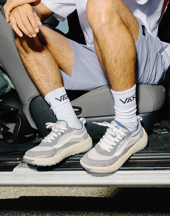 Close-up on a young man wearing the frost gray UltraRange Neo 2.0 in a car.