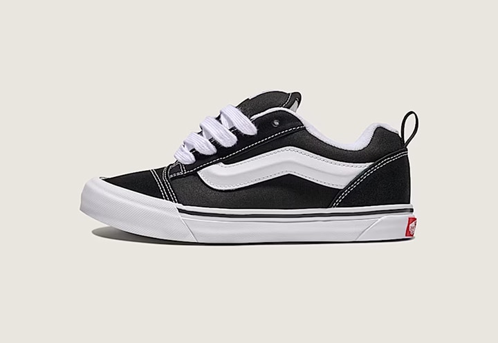 A black and white Big Kids Knu Skool in a photography studio.