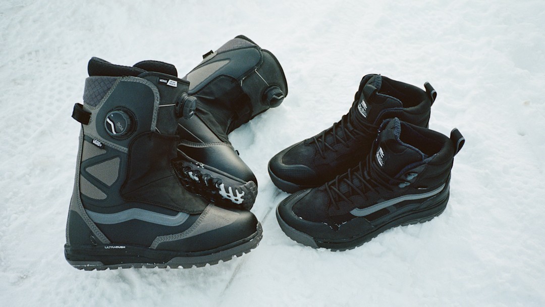 Snowboard boots on snow.