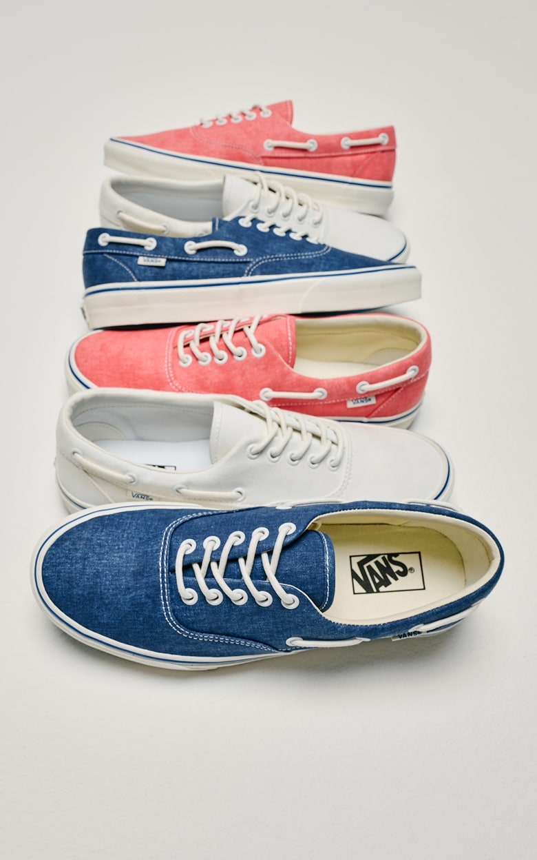 Top down view of the Authentic Boat Shoe on a floor and alternating colorways in the order of Cayenne Red, White, and Navy Blue / Marshmallow White.