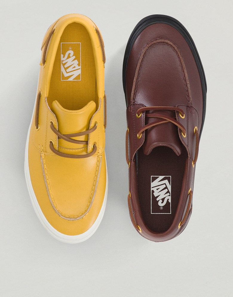 An overhead shot of the new Rum Raisin Purple colorway and the Spicy Mustard Yellow colorway on the 2-Eyelet Boat Shoe.