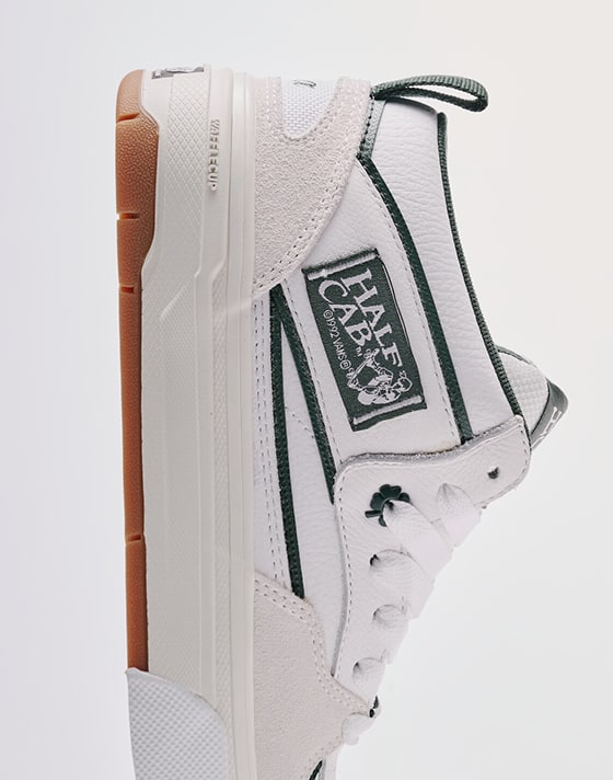 Medium shot of the Una Farrar Half Cab with WaffleCup standing vertically with a grey photography studio in the background.