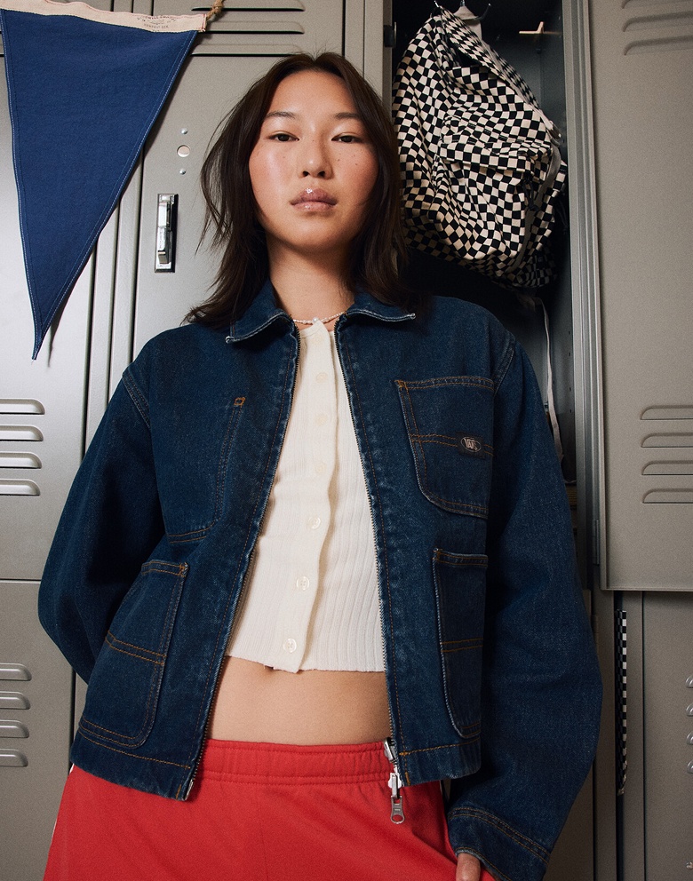 Two images: a young woman wearing a dark rinse blue Emily Boxy Work Wear Jacket and the other of a black and white Checkerboard Scatter Backpack.