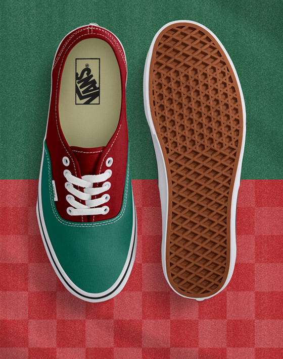 Top down view of the green/red Authentic with one shoe sole up and both on a split green/red background but the bottom half is checkered red.