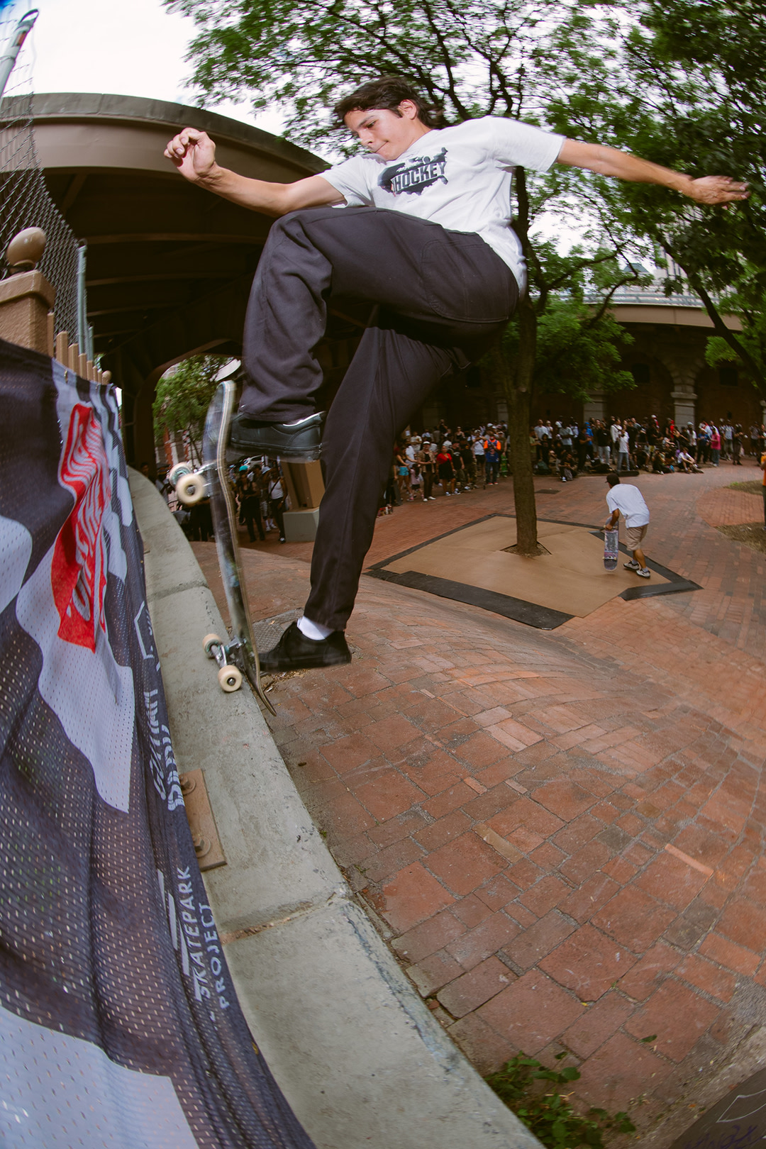 A skateboard athlete doing a trick off a wall at the Vans Go Skateboarding Day Event 2026