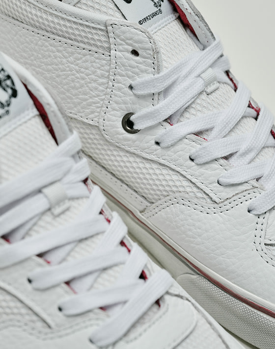Close-up on the details on a pair of white Half Cab Decon Shoe.