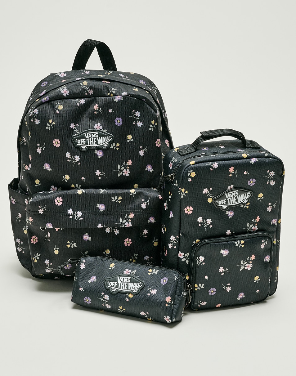 A black floral Old Skool Grom Backpack, Old Skool Lunch Bag, and an Old Skool Pencil Pouch Bag in a photo studio.