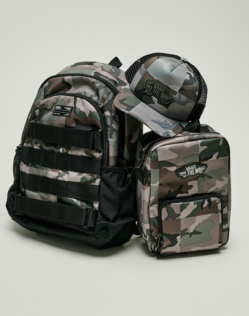 A camo Old Skool Backpack, Old Skool Lunch Bag, and Vans Off the Wall trucker hat.