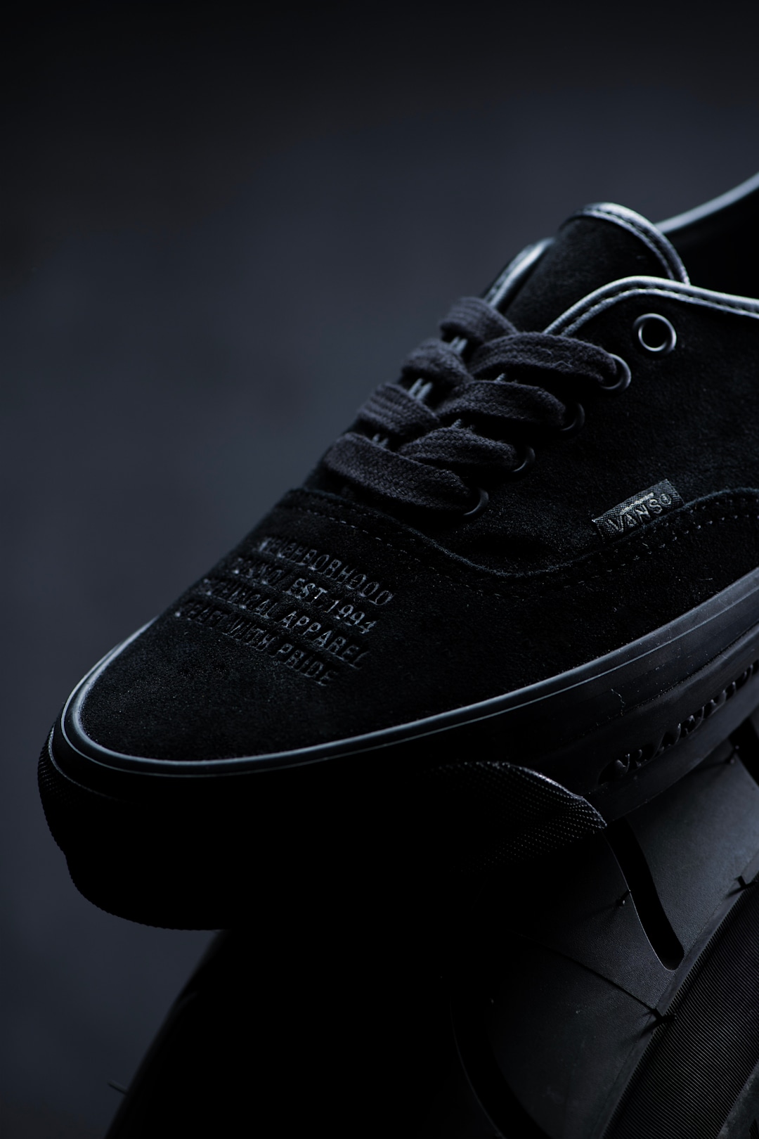 close up photo of black Vans Authentic OTW x NEIGHBORHOOD shoe collab