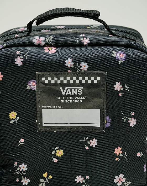 Close-up on the floral pattern on an Old Skool Lunch Bag in a photo studio.