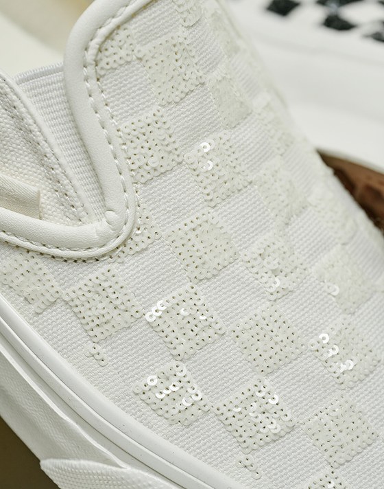 Close-up on the white sequins on the Checkerboard Classic Slip-On Shoe.