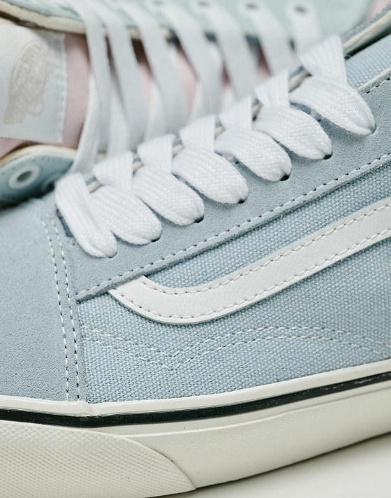 Close-up on a light blue Old Skool shoe.