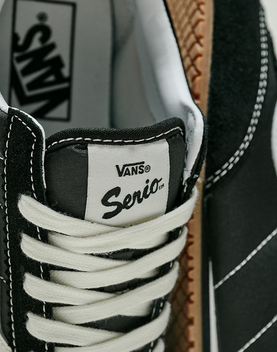Close-up on the Serio label on a black Super Lowpro shoe.