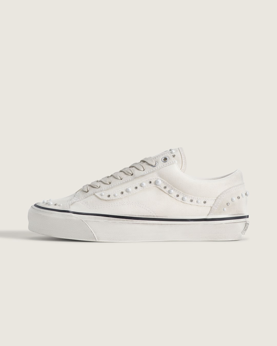 Studio shot of Vans Pearlized in Marshmallow White.