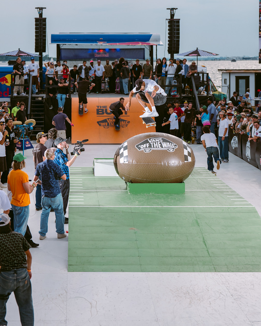 Chima Ferguson Kickflip over the Vans inflatable football
