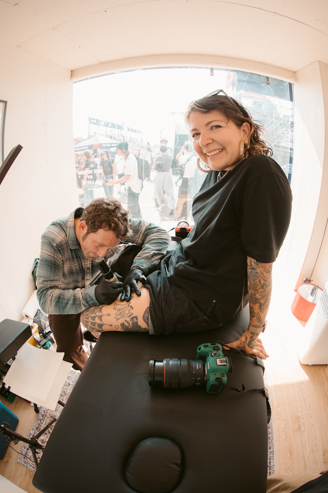 Mike Gigliotti giving tattoos in the other room of the Rowan Z3 Activation