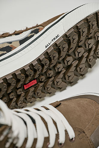 Close-up of a Vans shoe outsole with an All-Trac tread pattern designed for traction on varied terrain.