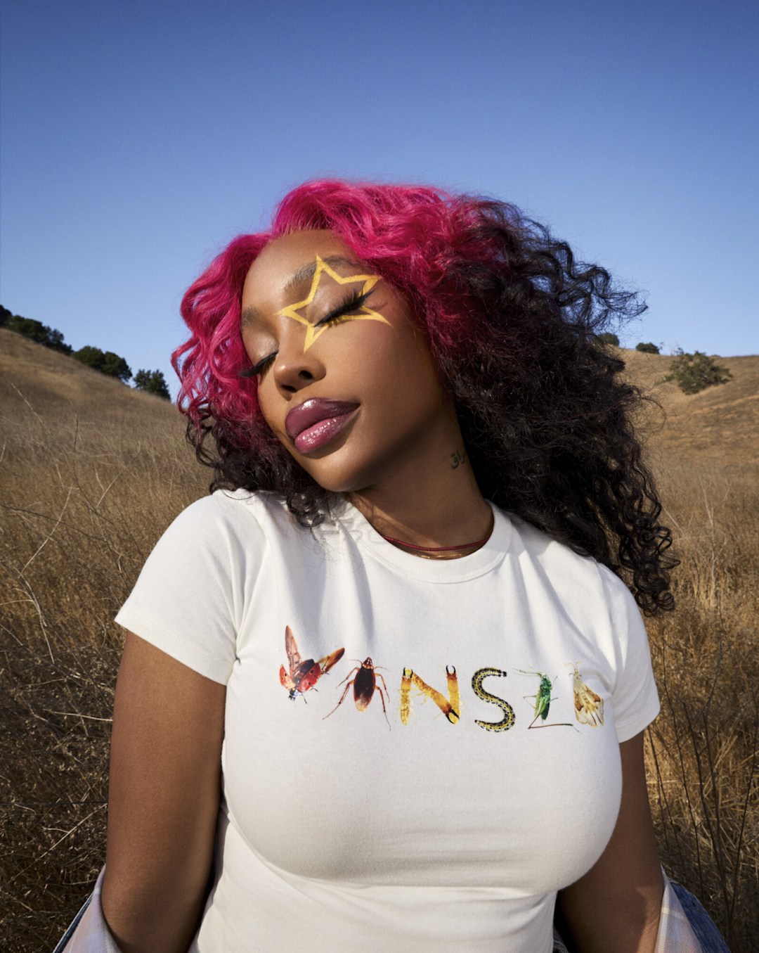 SZA in VANSZA BABY TEE.