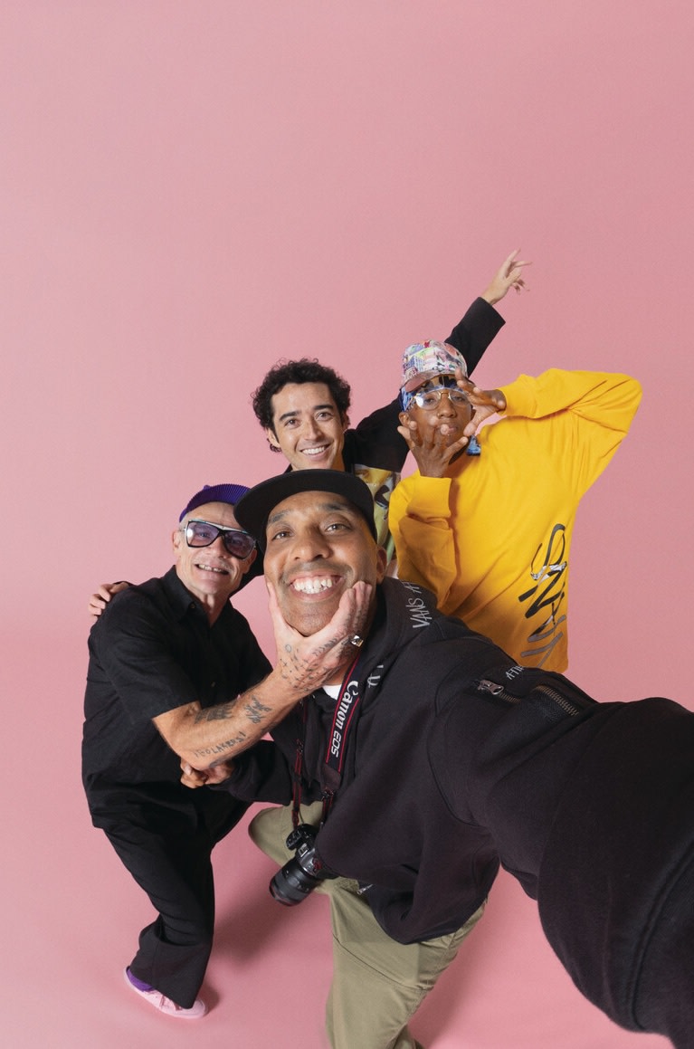 Atiba Jefferson taking a selfie with Flea, Rowan Zorilla, and Lauren Halsey.
