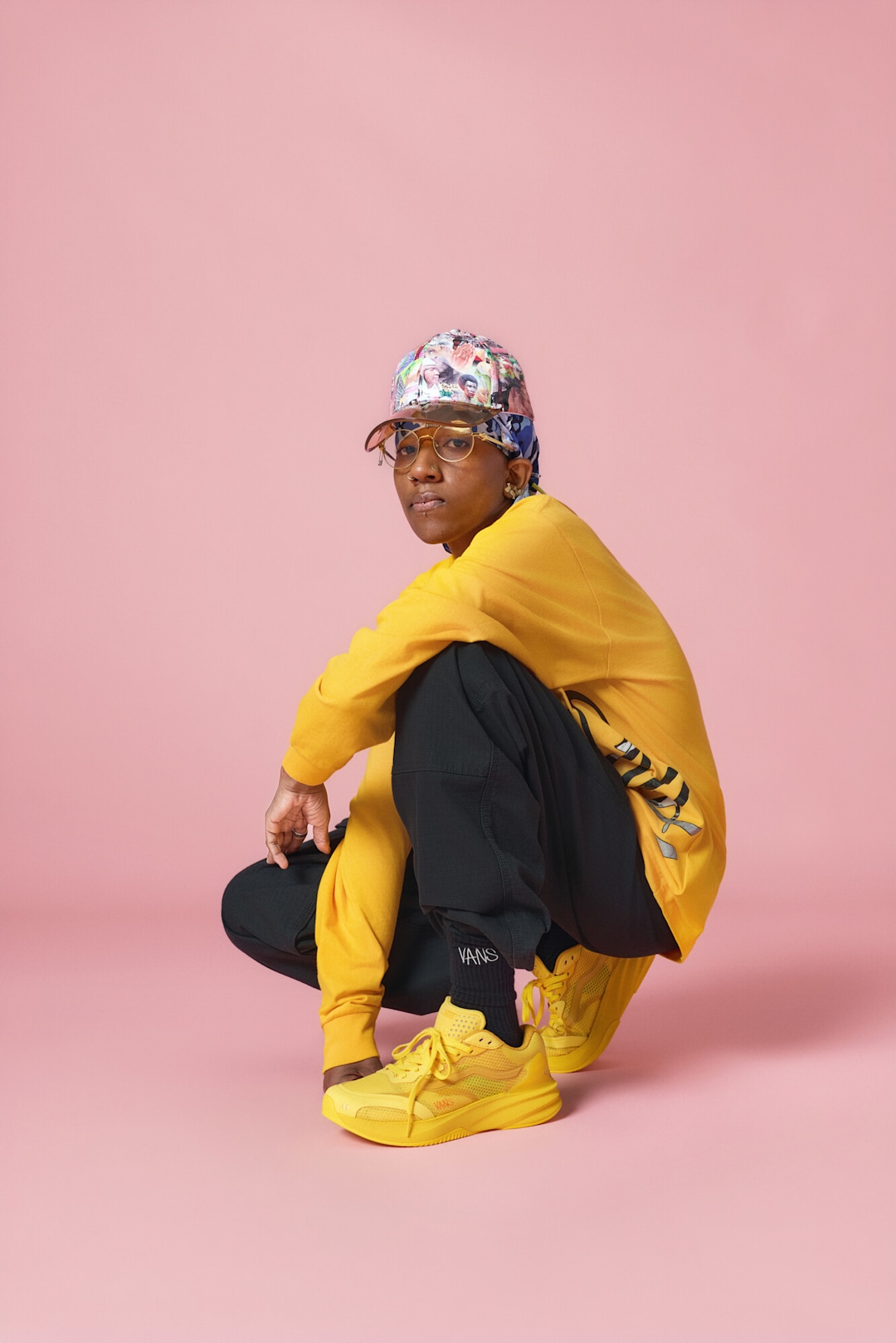 Lauren Halsey style in Vans x Atiba Long Sleeve Shirt, SweatPant, and Premium AVE Rapid Shoe.