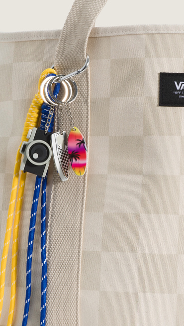 Extreme close-up of the Waffle Shop Sunset Snapshot Bag Charm Set on an Oatmeal Beige Pergs Midi Tote Bag.