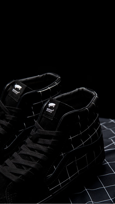 A close up of OTW X UNDERCOVER sk8-hi shoe in black